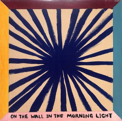 ON THE WALL IN THE MORNING LIGHT